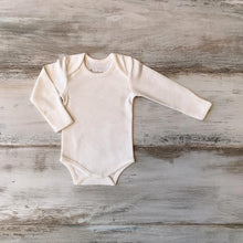 Load image into Gallery viewer, Organic Pima Cotton Baby Long Sleeve single picture of flat ecowhite white Bodysuit GOTS certified snap buttons handmade in Peru for Pan American Apparel in Ecowhite and soft pink for newborn 0 to 3 months 3 to 6 months 6 to 9 months 9 to 12 months 12 to 18 months
