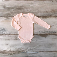 Load image into Gallery viewer, Organic Pima Cotton Baby Long Sleeve single picture of flat soft pink Bodysuit GOTS certified snap buttons handmade in Peru for Pan American Apparel in Ecowhite and soft pink for newborn 0 to 3 months 3 to 6 months 6 to 9 months 9 to 12 months 12 to 18 months
