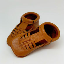 Load image into Gallery viewer, front shot of Soft Sole leather flexible handmade baby and toddler shoes moccs moccasins made in Peru genuine leather wide foot barefoot like shoes slip on feet sandal spring summer brown caramel neutral unisex
