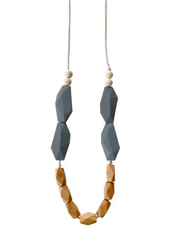 The Jacob Chewable silicone necklace in five colors blue tan brown with satin string for teething baby 